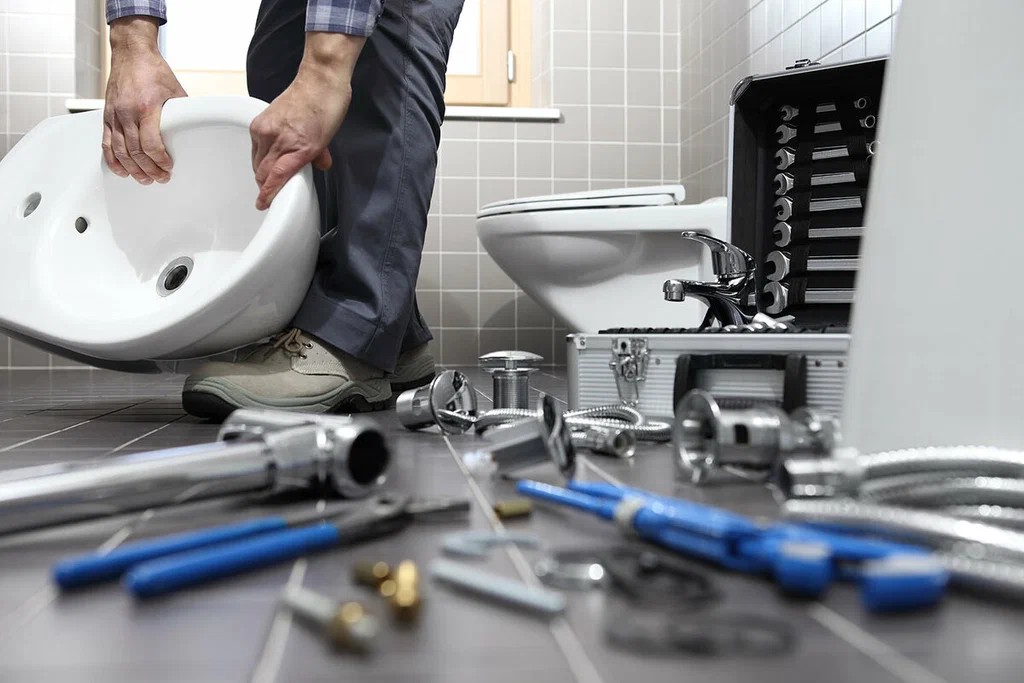 Plumbing tools prepared for a bathroom repair in Fort Collins