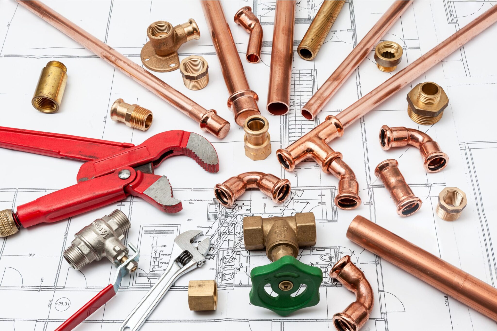 Copper pipes, fittings, valves, and plumbing tools in Fort Collins